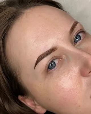 Healed brows on a client with freckled skin