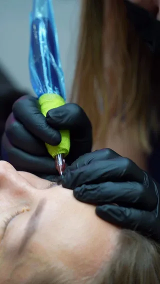 Lash enhancement being worked along the lash line